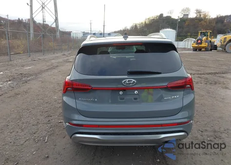 2022 Hyundai Santa Fe Calligraphy z USA, uszkodzony, nr VIN 5NMS5DAL2NH404452